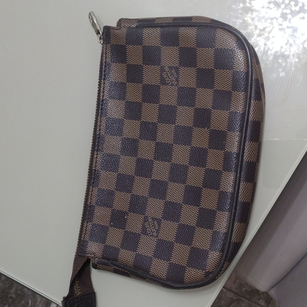 Authentic vintage Louis Vuitton makeup bag.